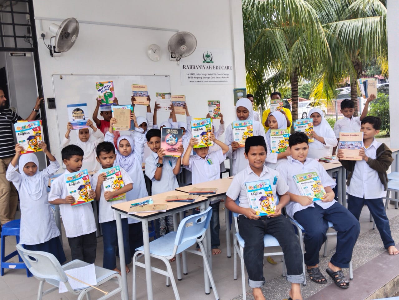 Hopeful student smiling in a classroom
